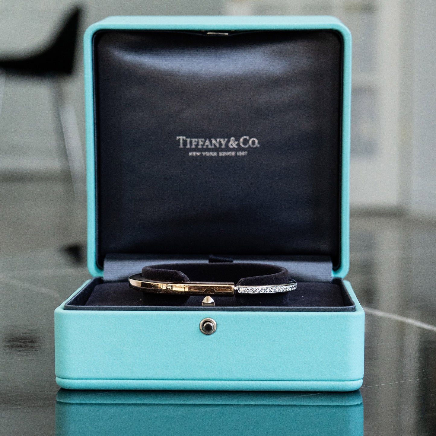 Tiffany & Co. Two Tone Bangle With Half Diamond Pave