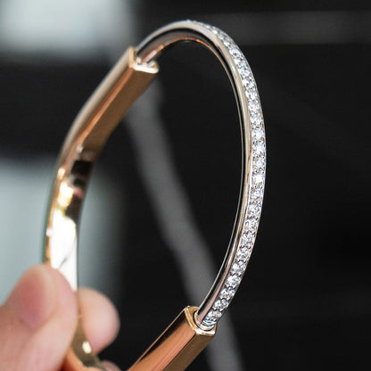 Tiffany & Co. Two Tone Bangle With Half Diamond Pave