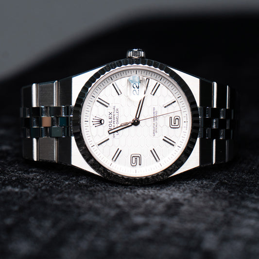 Pre-Owned Rolex 127334 Land-Dweller White Dial Stainless Steel Watch Full Set