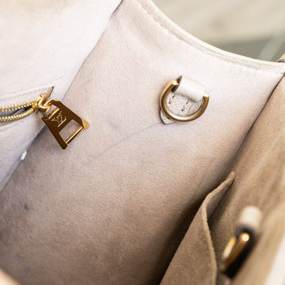 Louis Vuitton OnTheGo BB in Tourterelle Handbag