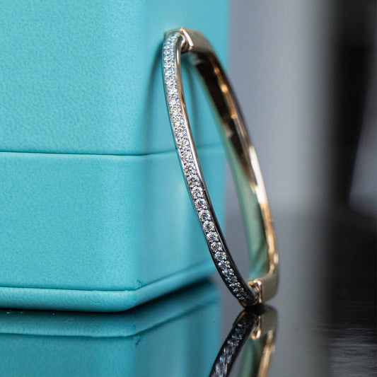 Tiffany & Co. Two Tone Bangle With Half Diamond Pave