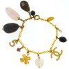 Chanel Gold Tone CC Logo Crystal Charms No 5 Clover Stone Gems Quartz Bracelet