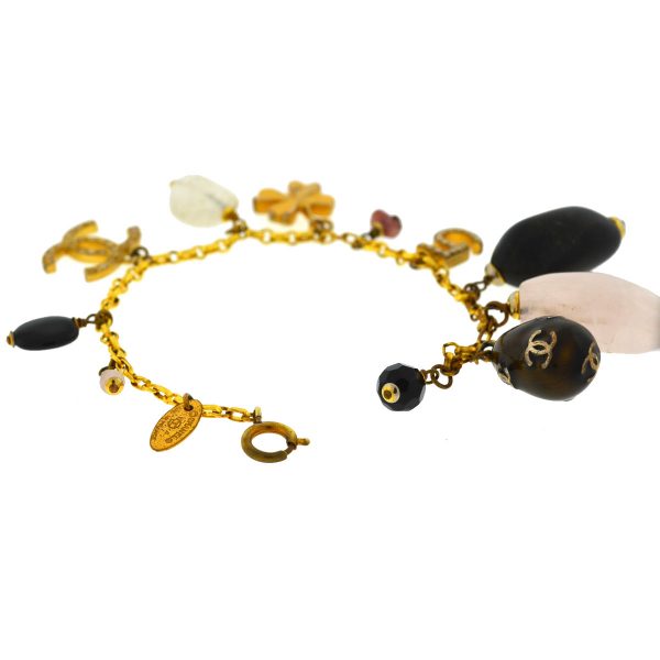 Chanel Gold Tone CC Logo Crystal Charms No 5 Clover Stone Gems Quartz  Bracelet