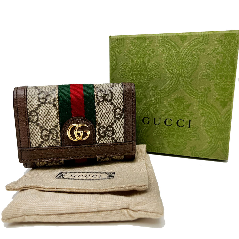Gucci GG Supreme Monogram Blooms Canvas Large Cosmetic Case Clutch - Boca  Pawn